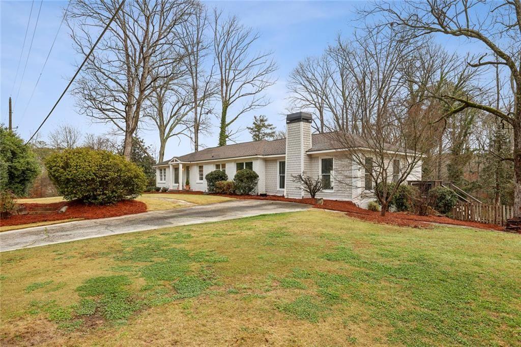 13325 Providence Road Milton, GA 30009 - Photo 4 of 50 a view of house with outdoor space and swimming pool