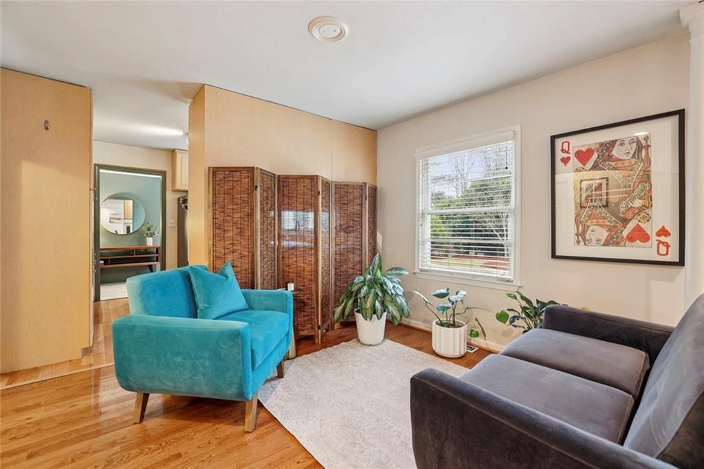 13325 Providence Road Milton, GA 30009 - Photo 8 of 50 a living room with furniture and a large window