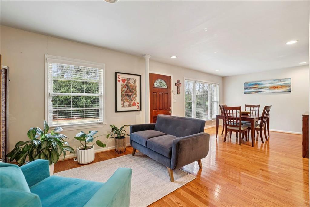 13325 Providence Road Milton, GA 30009 - Photo 9 of 50 a living room with furniture and a large window