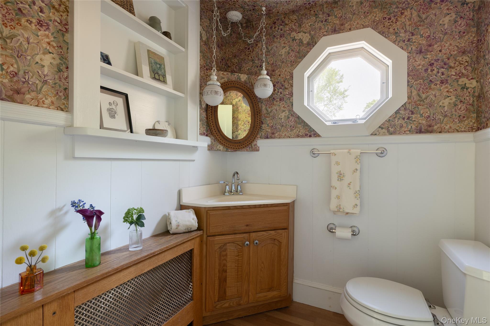 185 Verbank Village Road Millbrook, NY 12545 - Photo 11 of 22 a bathroom with a toilet sink vanity and mirror