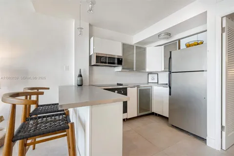 $295,000 | 770 Northeast 69th Street, Unit 8E, Miami, FL 33138