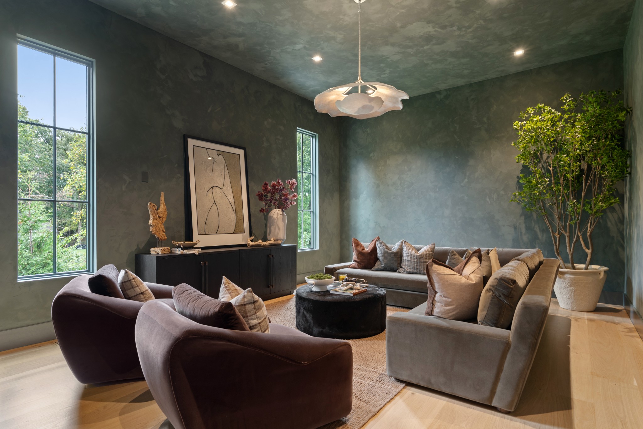 6030 Bresslyn Road Nashville, TN 37205 - Photo 43 of 59 a living room with furniture and a chandelier