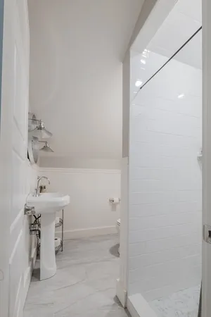 a bathroom with a sink and mirror