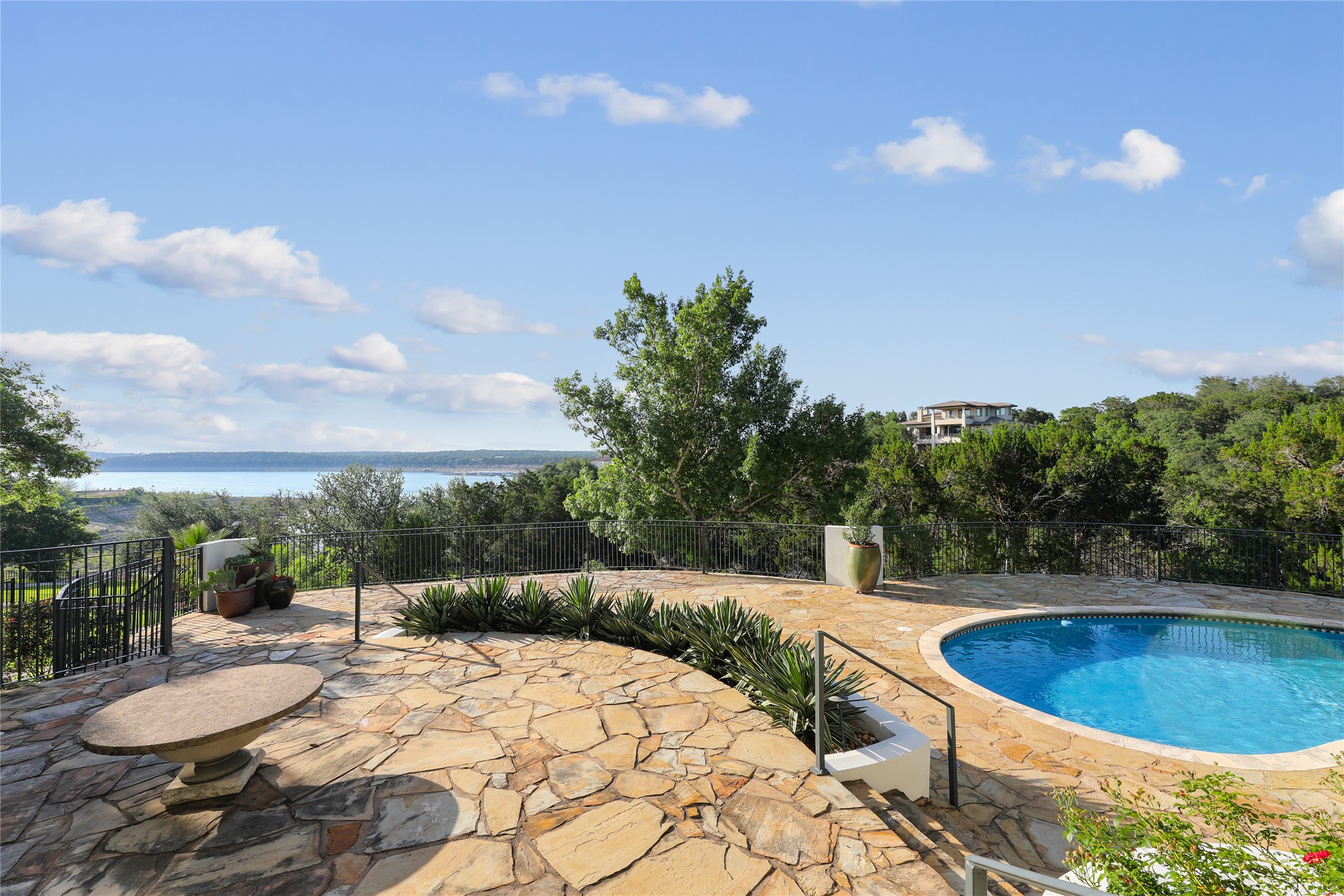 16010 Canard Circle Austin, TX 78734 - Photo 2 of 35 a view of a swimming pool with a yard