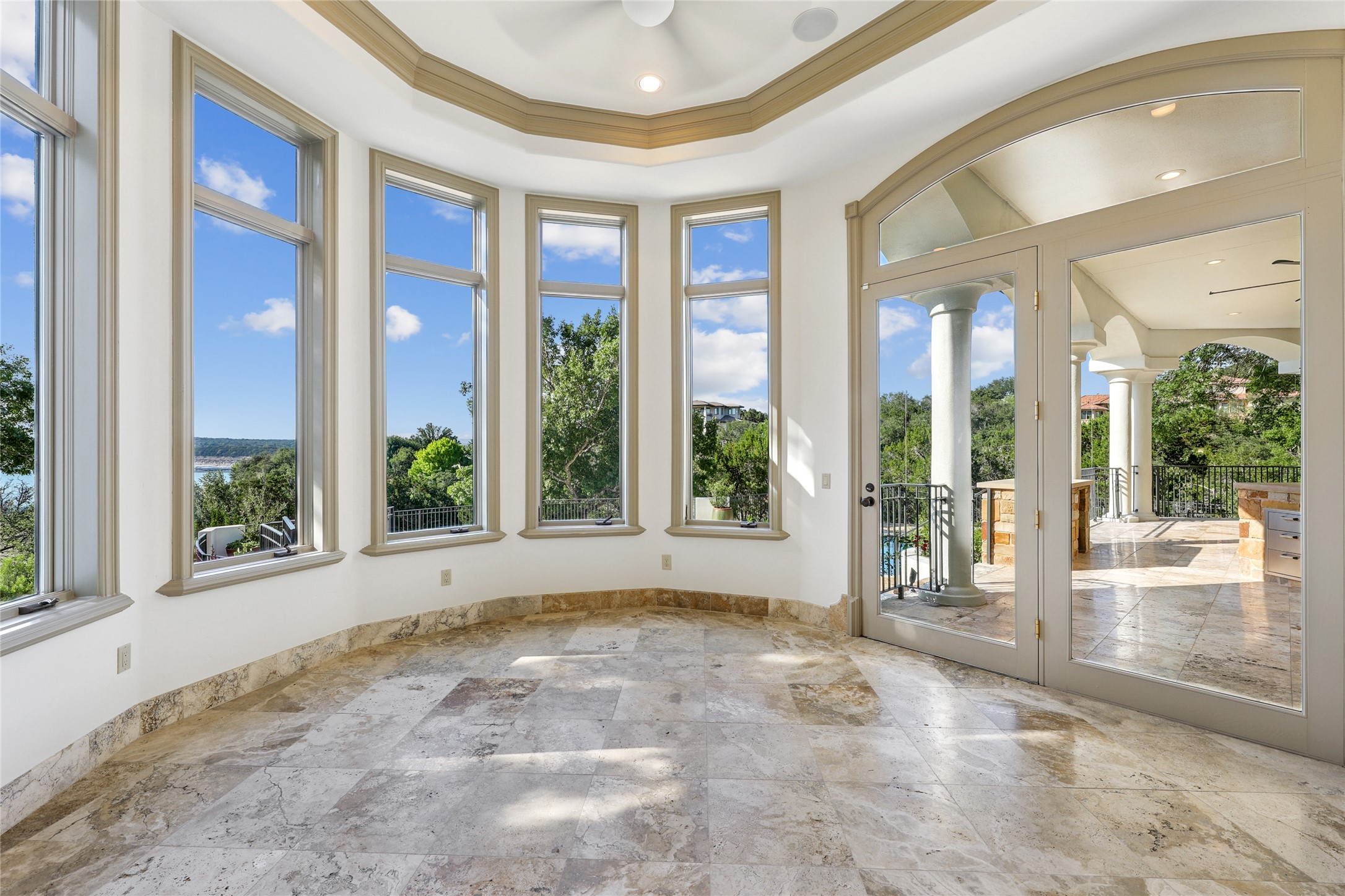 16010 Canard Circle Austin, TX 78734 - Photo 26 of 35 a view of an entryway with floor to ceiling windows
