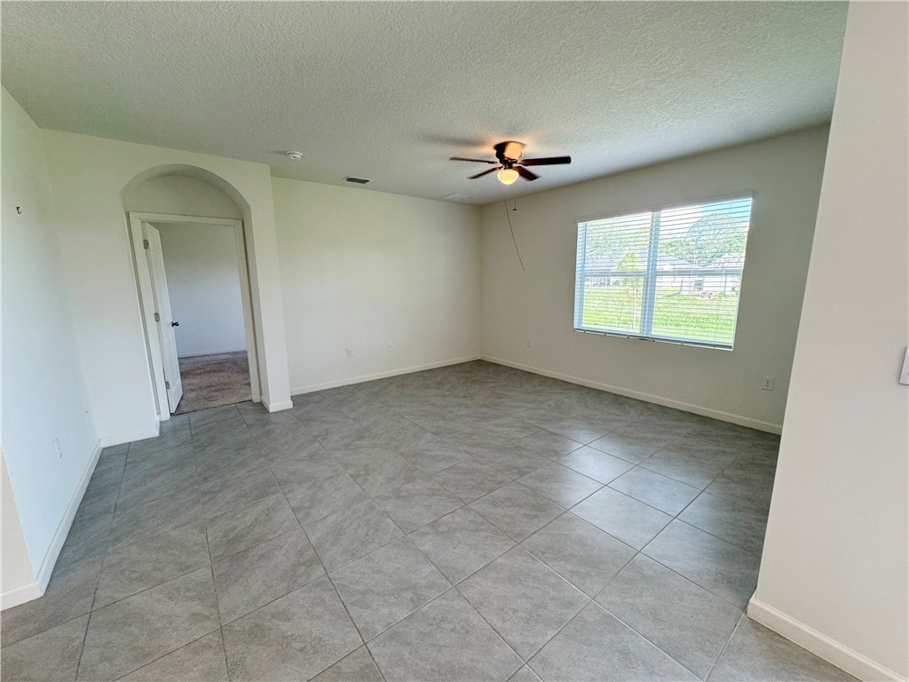 1836 Barber Street Sebastian, FL 32958 - Photo 14 of 29 a view of an empty room with a window