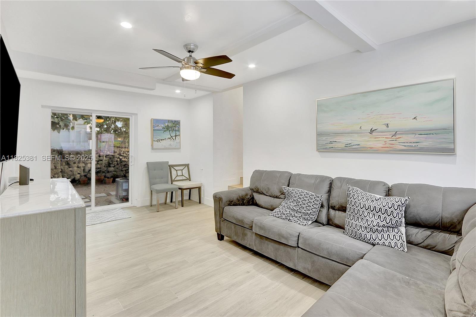 33 Southwest 20th Road Miami, FL 33129 - Photo 17 of 29 a living room with furniture and a large window