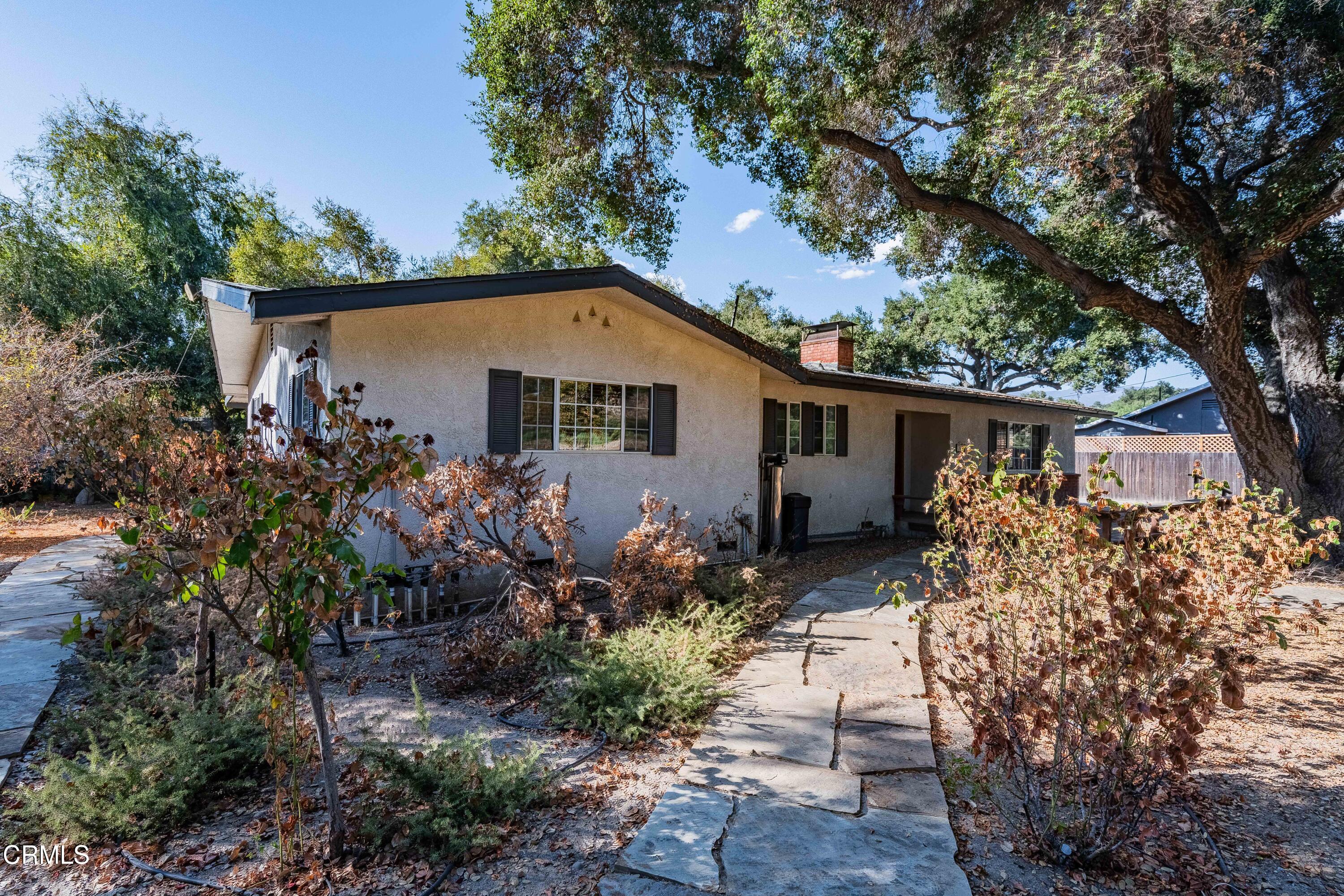 467 Riverside Road Oak View, CA 93022 - Photo 4 of 65 a view of house with a yard and garden