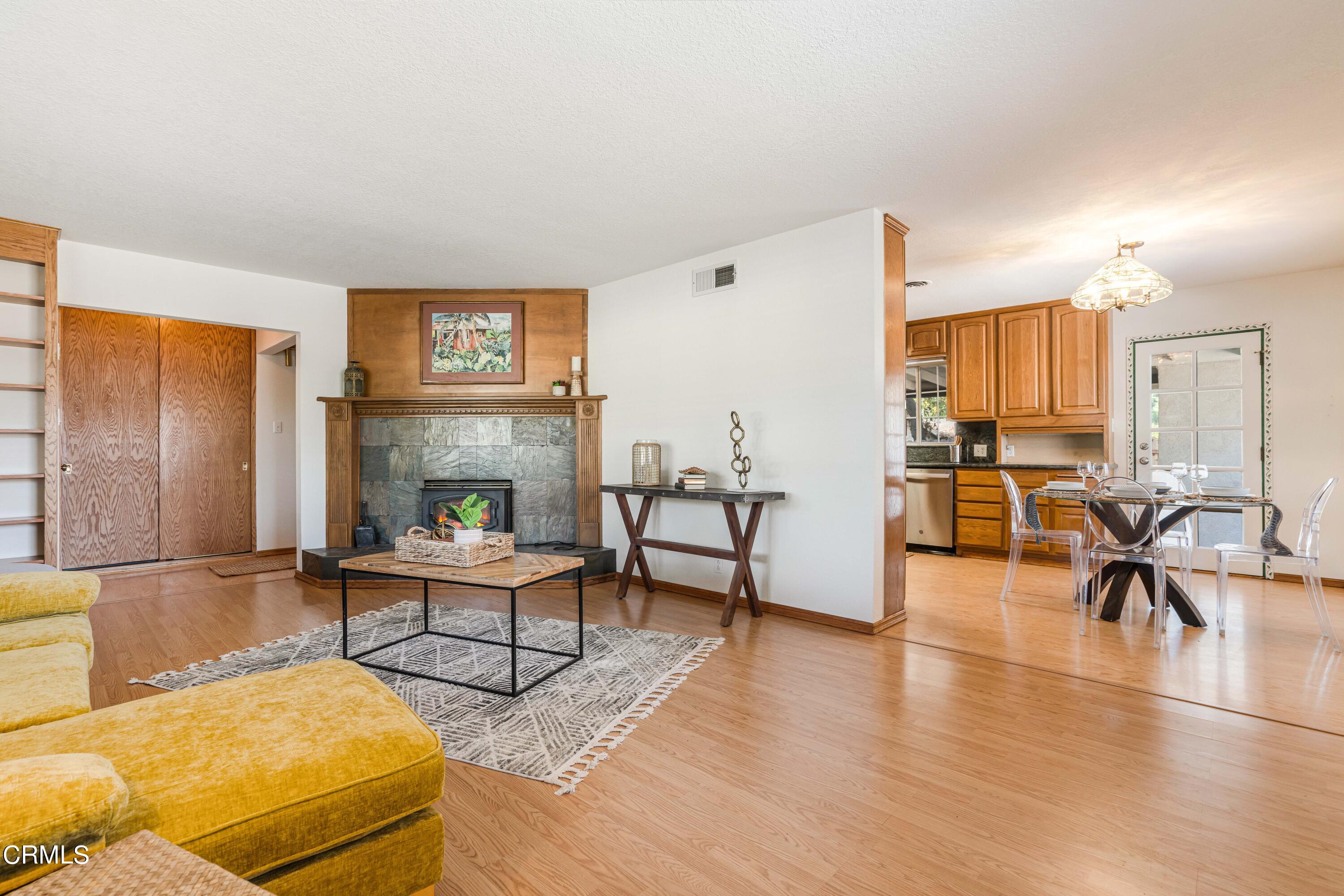 467 Riverside Road Oak View, CA 93022 - Photo 8 of 65 a living room with furniture and a fireplace