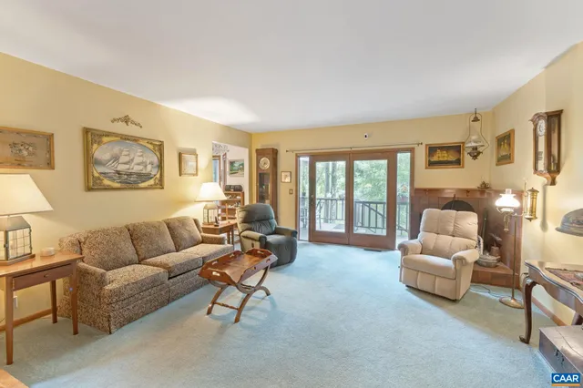 a bathroom with a sink mirror and a shower