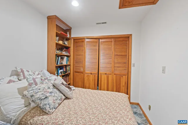 a view of a lake with a building in the background