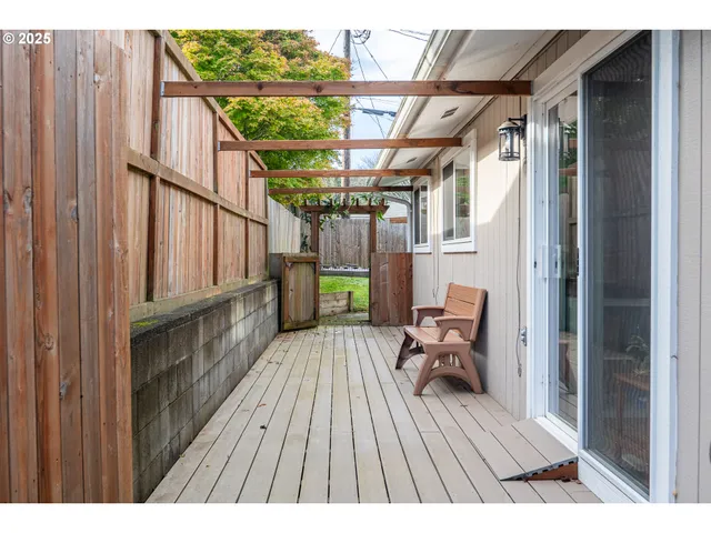 a bedroom with a bed and a potted plant