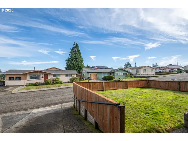 a view of a swimming pool with an outdoor seating