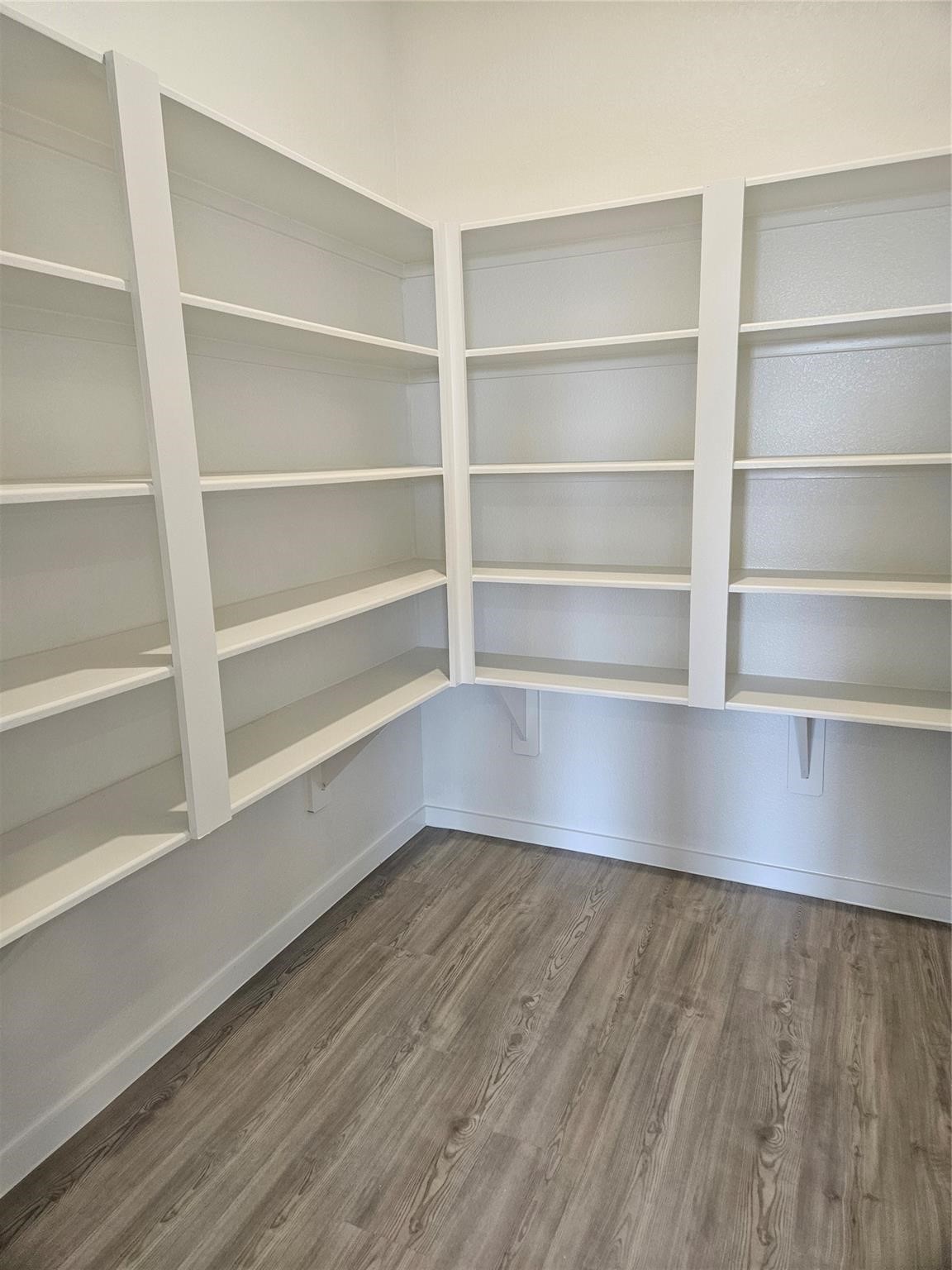2502 Rose Gold Drive Rosharon, TX 77583 - Photo 7 of 30 a view of a room with wooden floor
