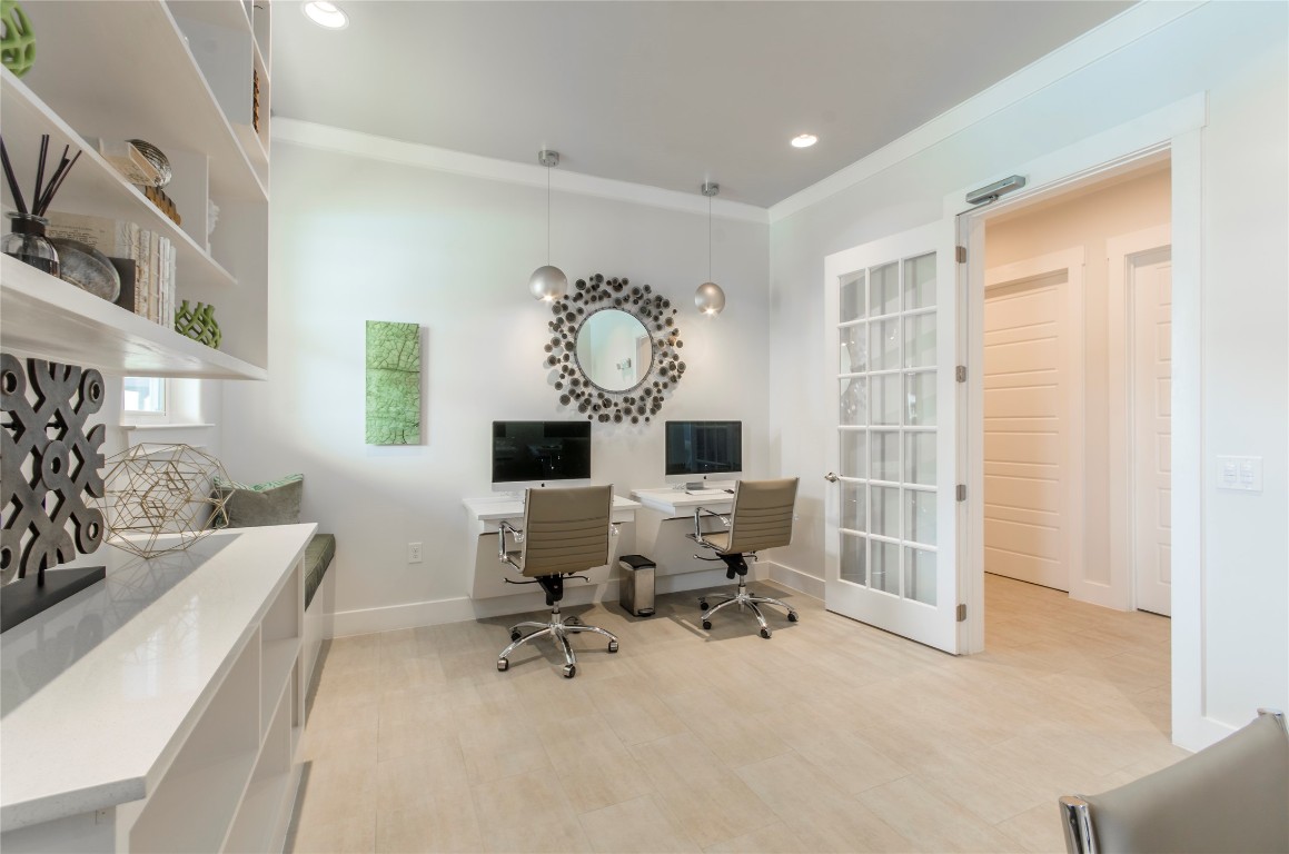 3300 Towers Boulevard, Unit 958 Seabrook, TX 77586 - Photo 25 of 33 a view of a workspace with furniture and a window