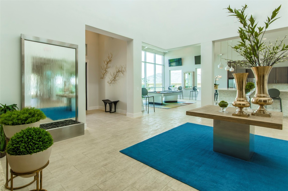 3300 Towers Boulevard, Unit 958 Seabrook, TX 77586 - Photo 29 of 33 a living room with furniture and a potted plant