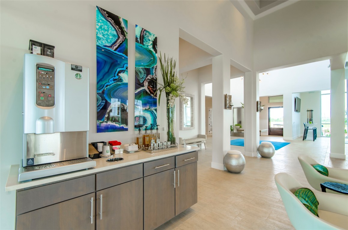 3300 Towers Boulevard, Unit 958 Seabrook, TX 77586 - Photo 31 of 33 a view of a kitchen area with furniture and cabinets