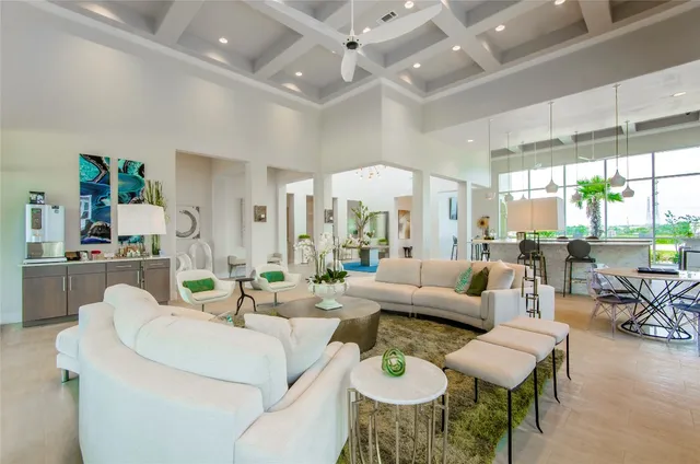 a view of a kitchen area with furniture and cabinets
