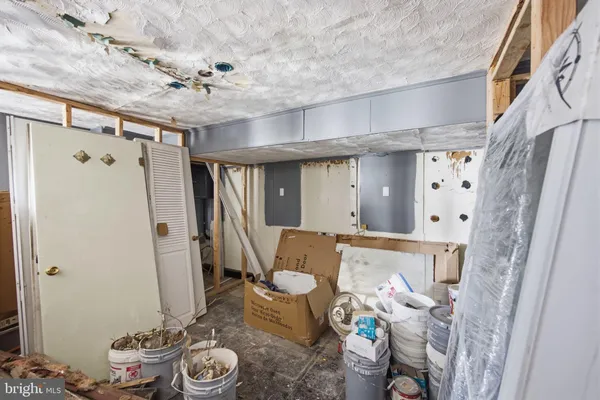 a bathroom with a sink a mirror and shower