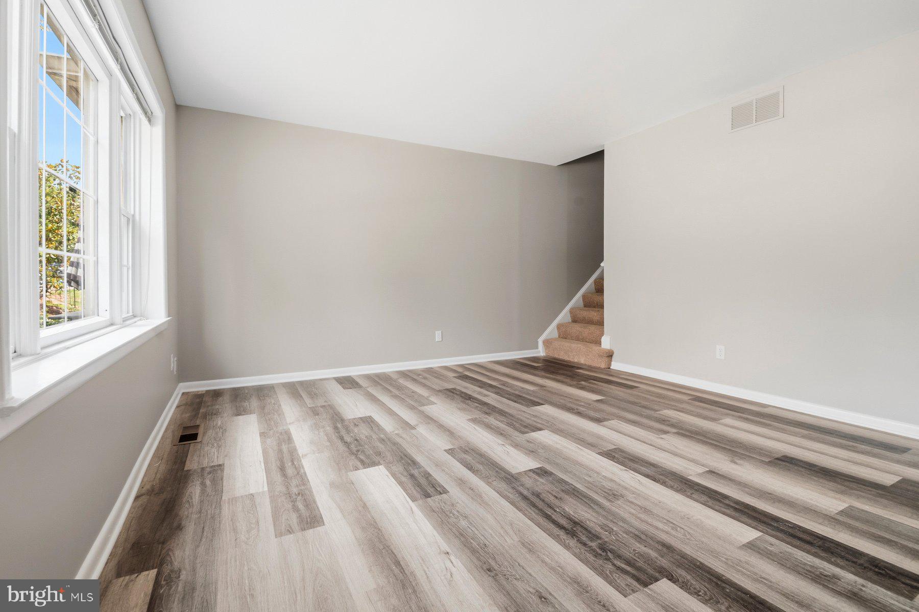 9080 Moonshine Hollow, Unit F Laurel, MD 20723 - Photo 13 of 24 Bright and airy open space awaits.