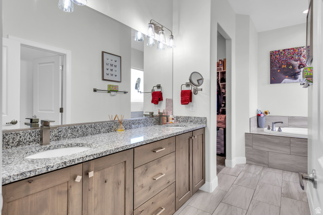 6105 Bunda Way St. George, UT 84790 - Photo 19 of 49 Dual vanity with granite countertop and integrated sinks