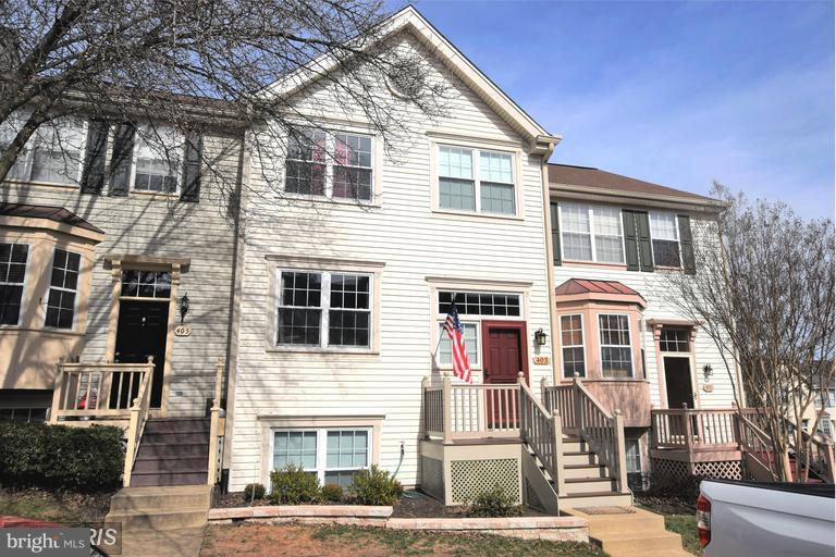 403 McDaniel Drive Purcellville, VA 20132 - Photo 1 of 13 a front view of a house with a yard