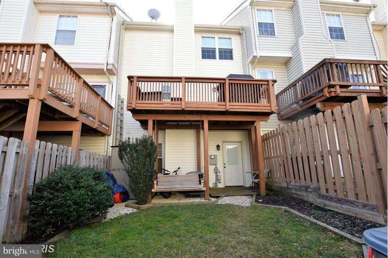 403 McDaniel Drive Purcellville, VA 20132 - Photo 13 of 13 a view of backyard with a garden and deck