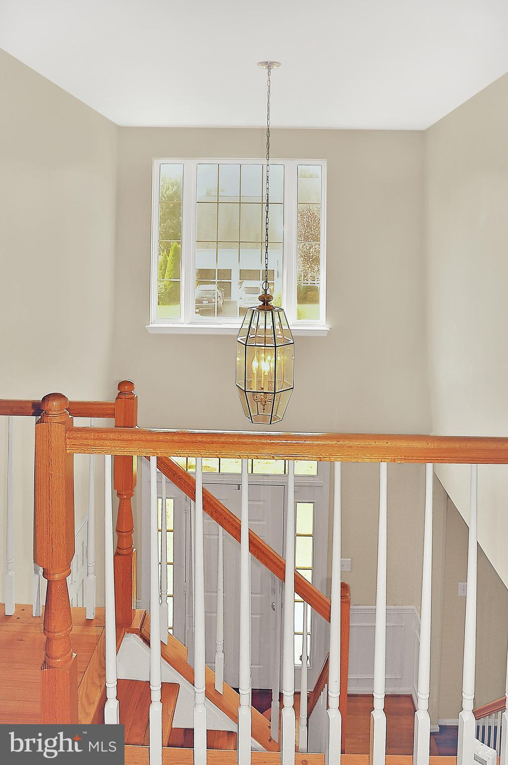 20907 Chippoaks Forest Circle Sterling, VA 20165 - Photo 19 of 71 The expanisve window above the foyer