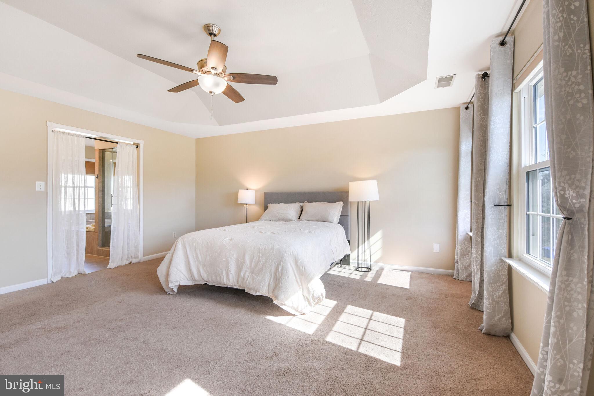 20907 Chippoaks Forest Circle Sterling, VA 20165 - Photo 21 of 71 a bedroom with a bed and window