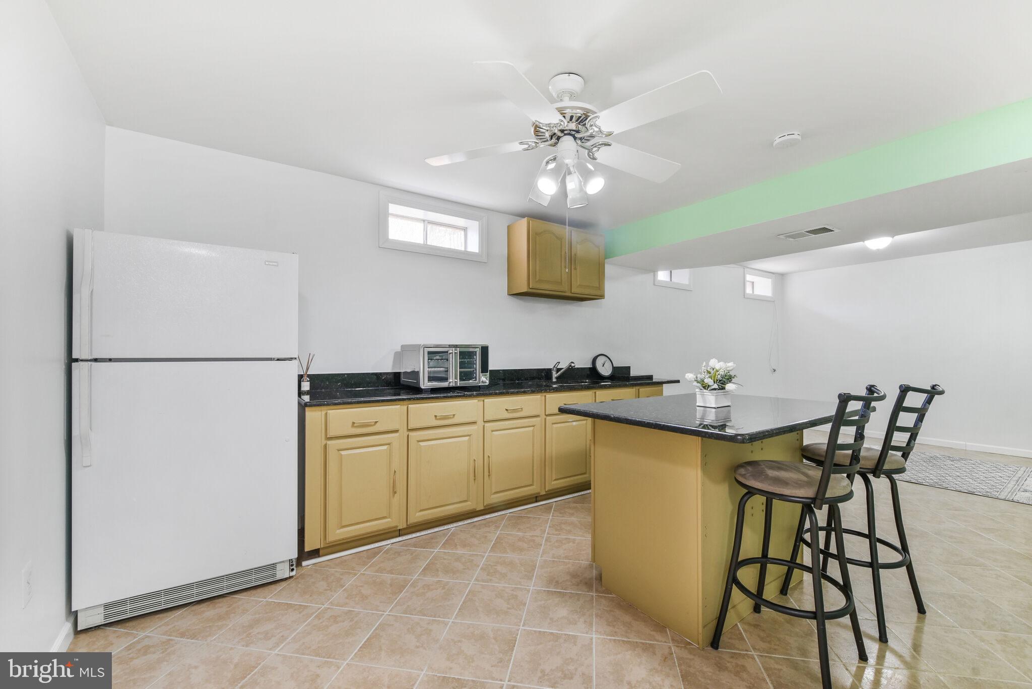 20907 Chippoaks Forest Circle Sterling, VA 20165 - Photo 45 of 71 Basement Kitchenette