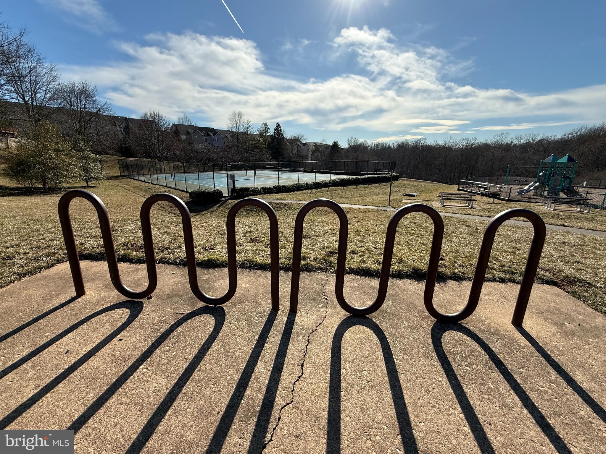 20907 Chippoaks Forest Circle Sterling, VA 20165 - Photo 70 of 71 a couple of benches sitting next to a yard