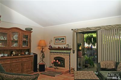 La Mancha Drive Sonoma, CA 95476 - Photo 4 of 9 a living room with furniture and a fireplace