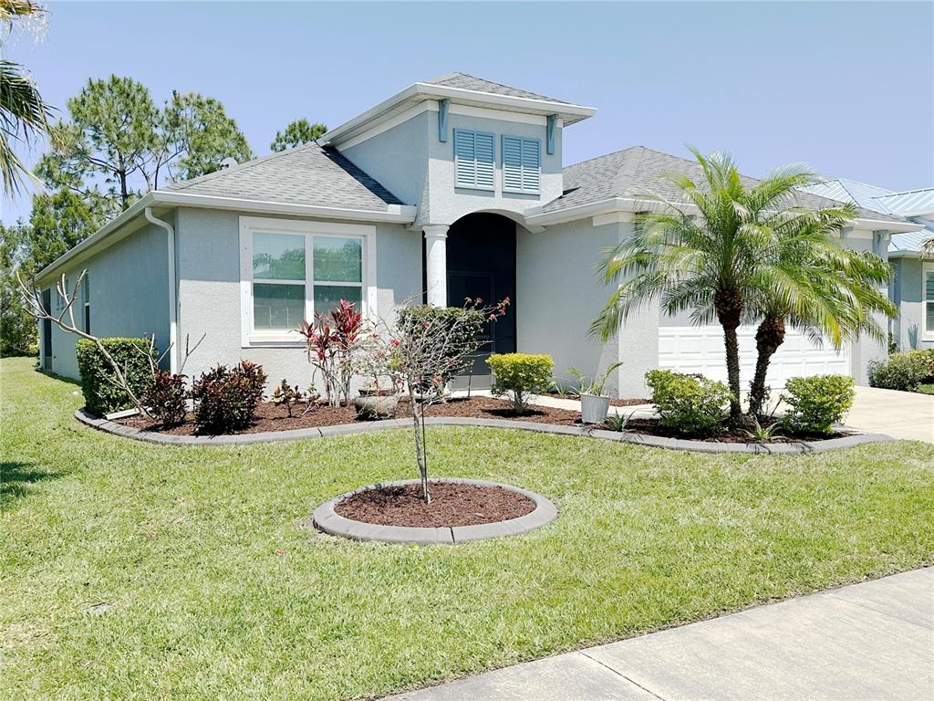 a front view of a house with entertaining space