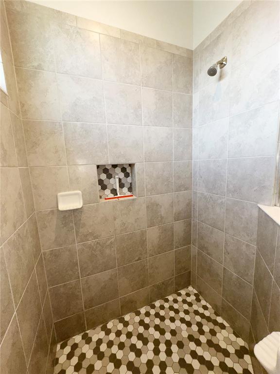 3775 Manorwood Loop Parrish, FL 34219 - Photo 16 of 30 a bathroom with a shower