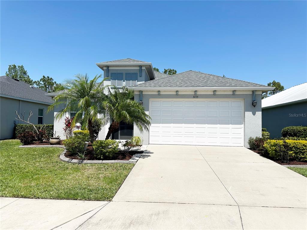 3775 Manorwood Loop Parrish, FL 34219 - Photo 2 of 30 a front view of a house with a yard