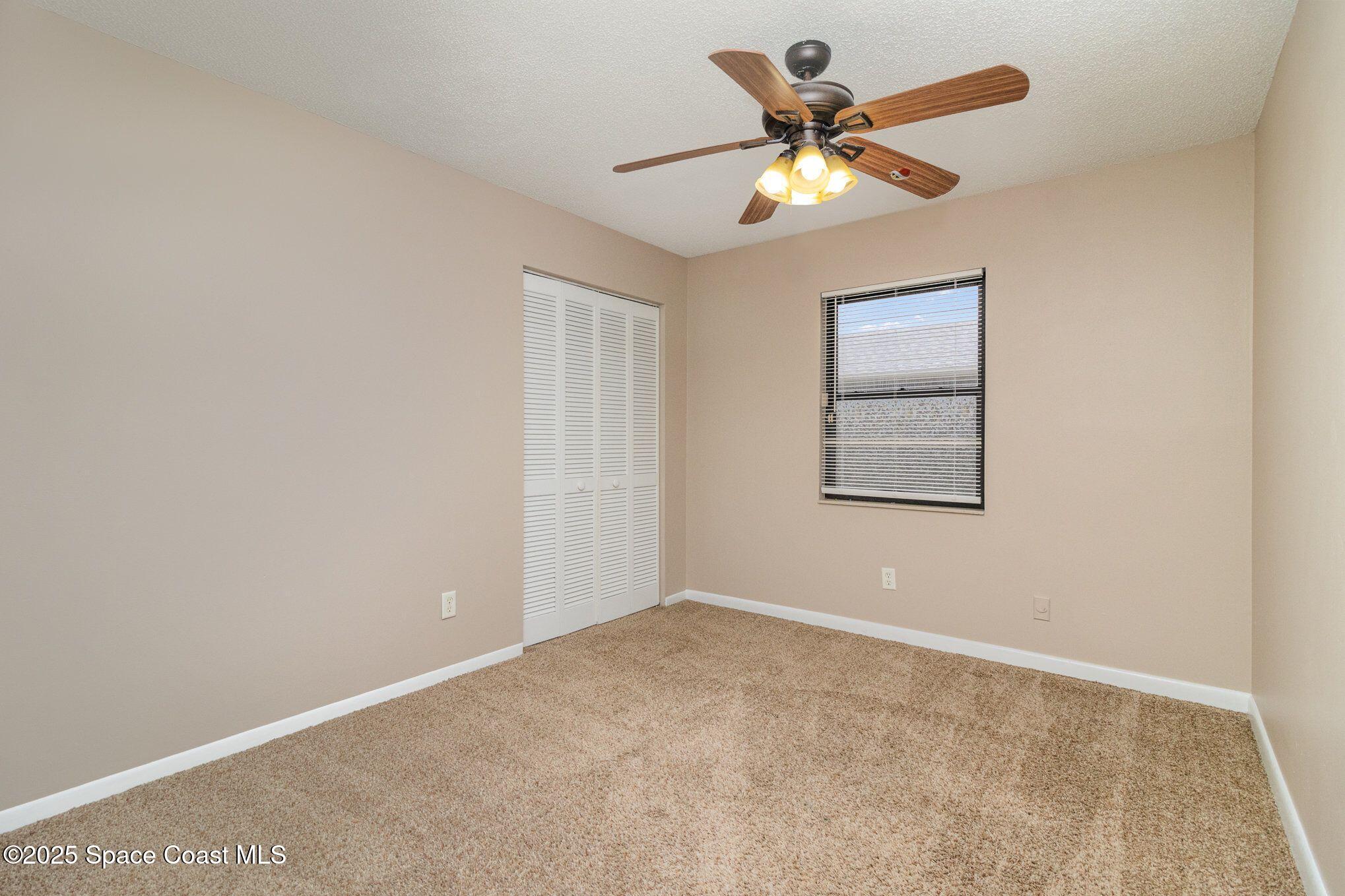 2863 Corbusier Drive Melbourne, FL 32935 - Photo 12 of 20 an empty room