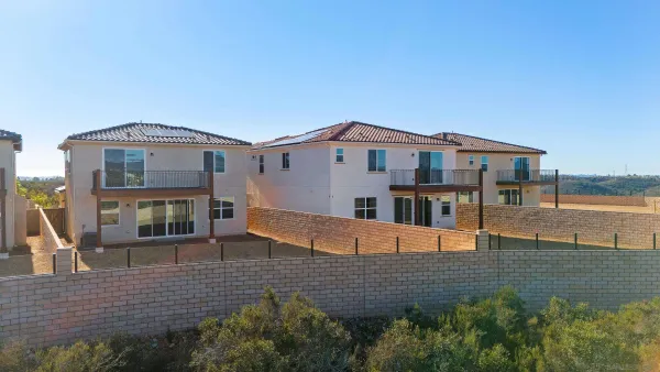 a view of a house with roof deck
