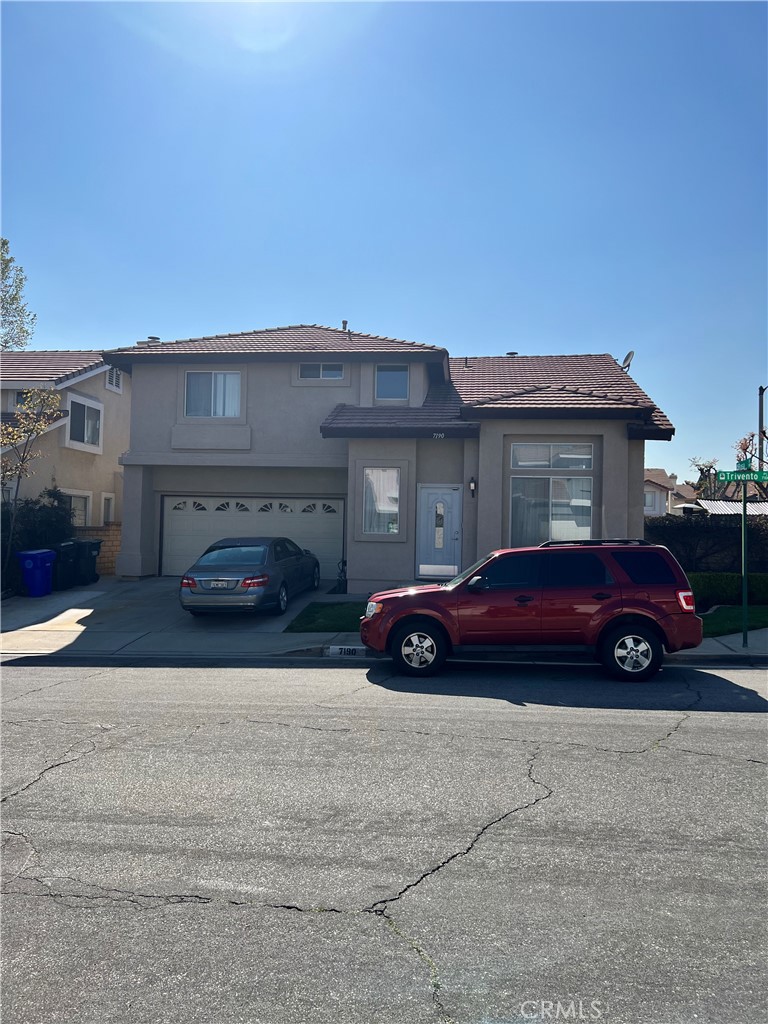 7190 Trivento Place Rancho Cucamonga, CA 91701 - Photo 1 of 1 a car parked in front of a building