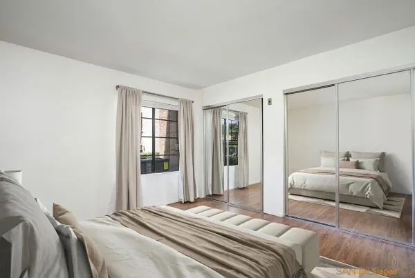 a view of a house with swimming pool and sitting area