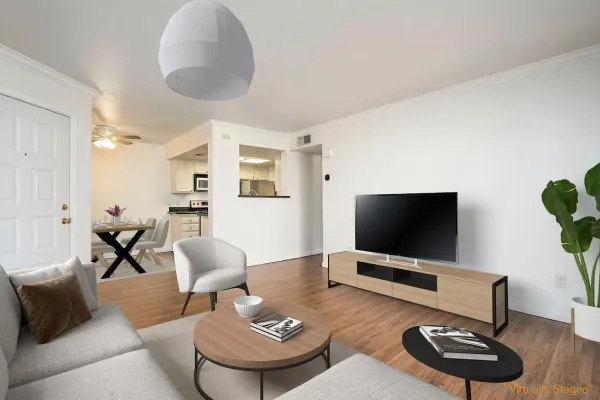 a kitchen with granite countertop a stove and a microwave