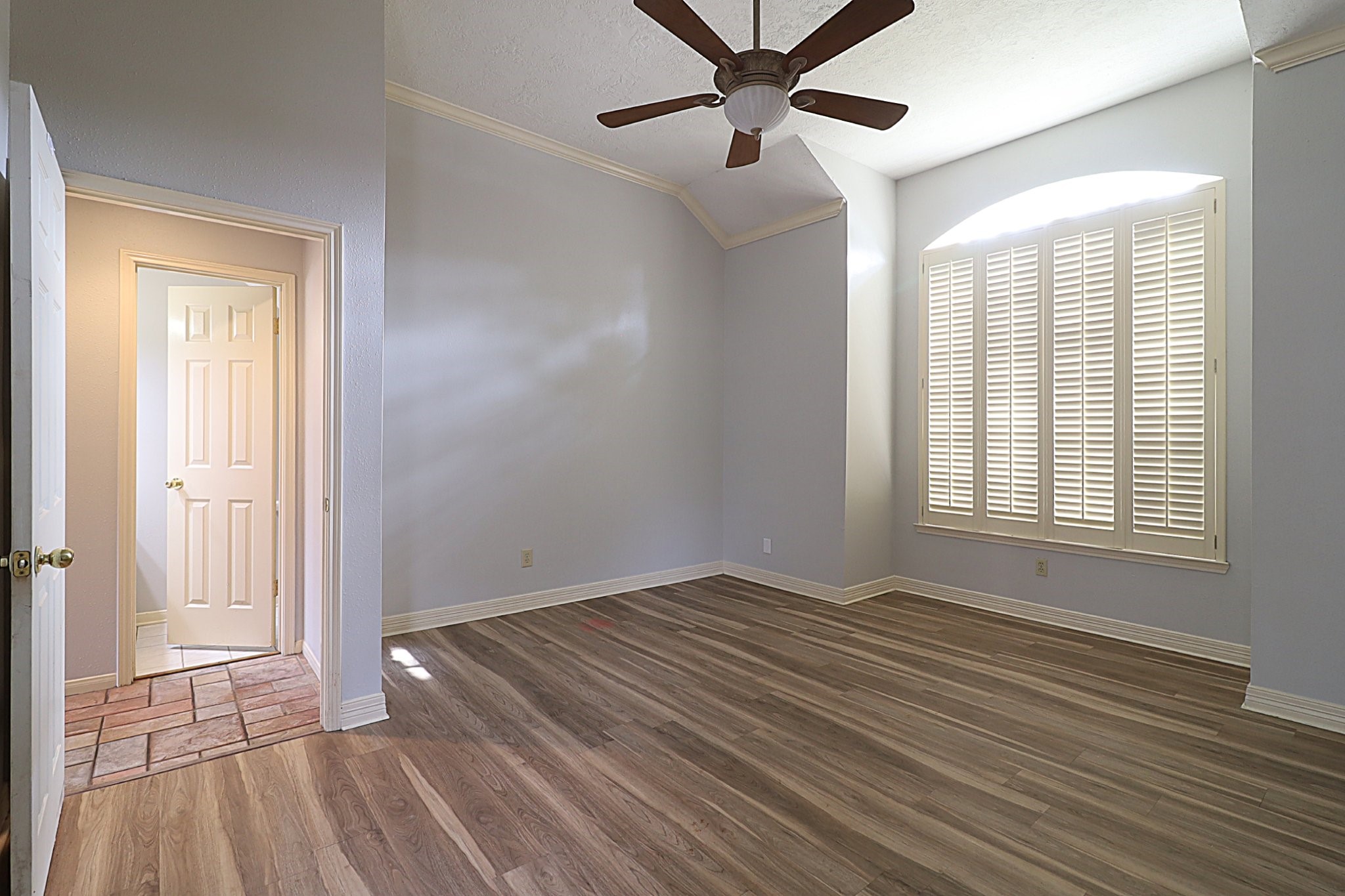 3510 Cypressdale Drive Spring, TX 77388 - Photo 12 of 32 Primary bedroom with 2" plantation shutters. Across the hall, the half bath for guests.