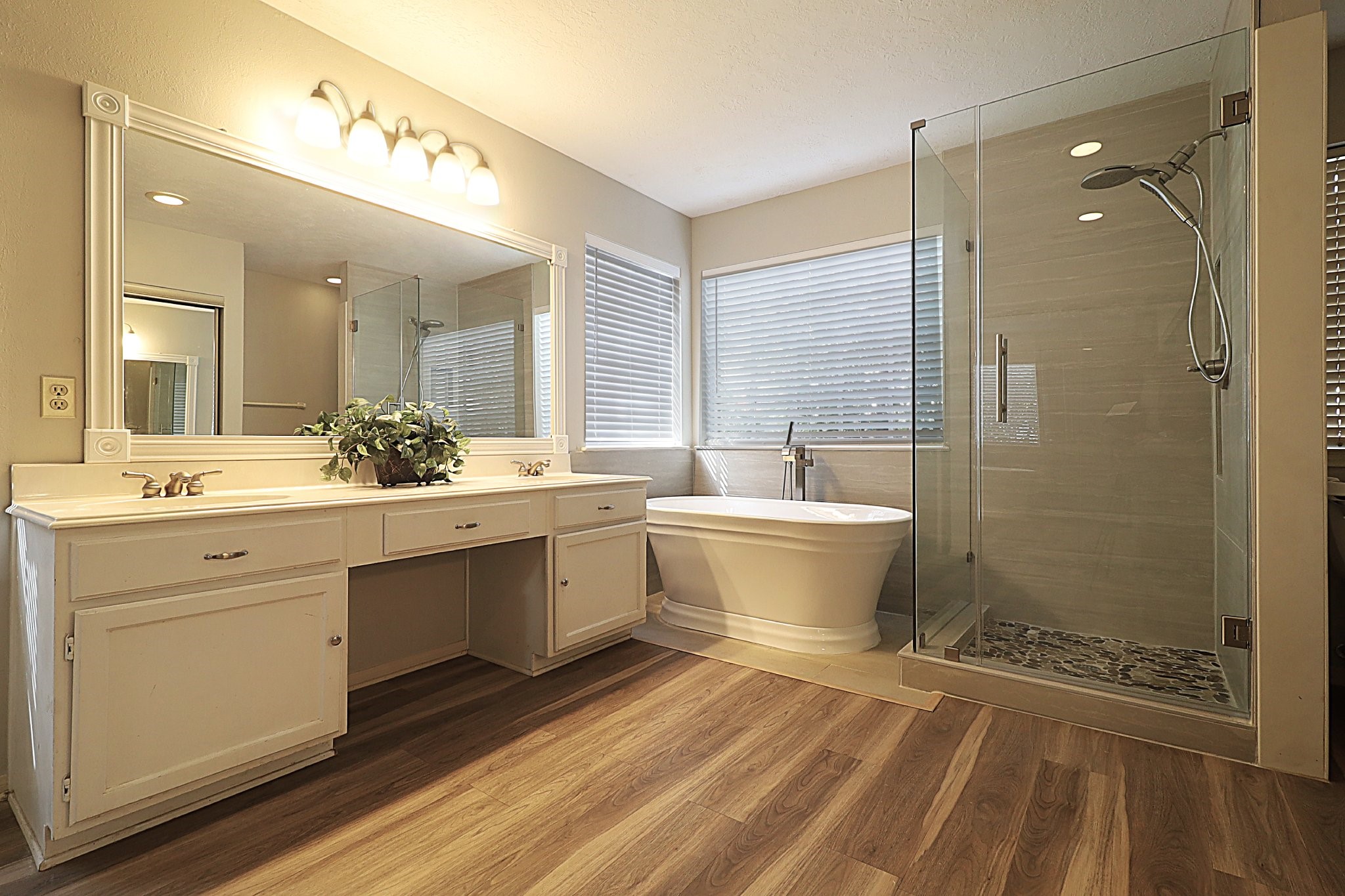 3510 Cypressdale Drive Spring, TX 77388 - Photo 15 of 32 New freestanding tub and shower with tiling and spa-like pebble stone flooring.