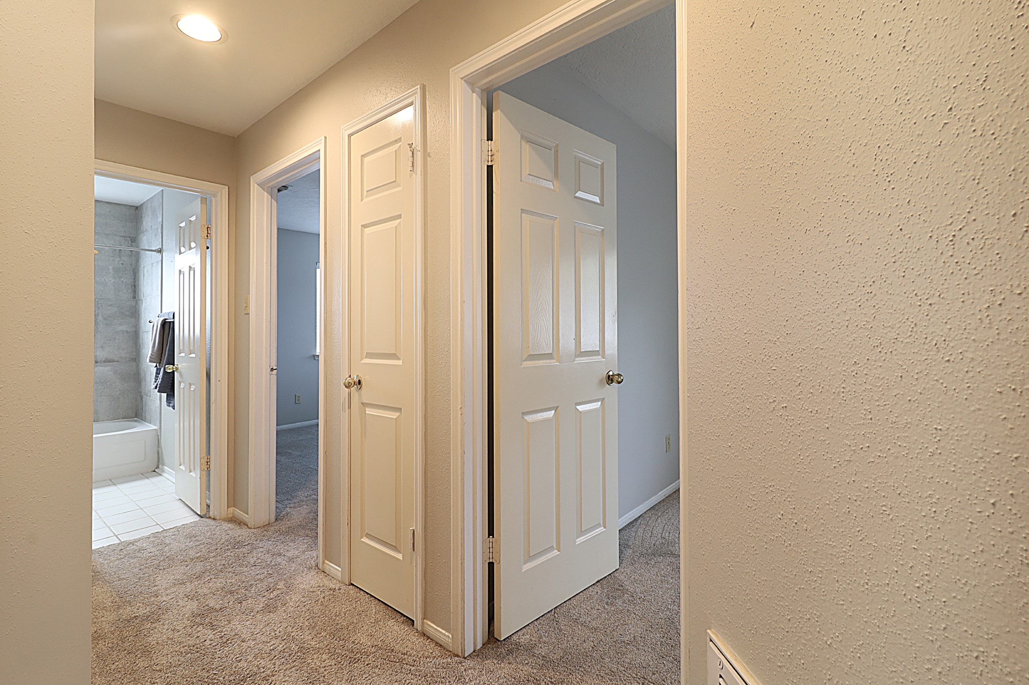 3510 Cypressdale Drive Spring, TX 77388 - Photo 18 of 32 Hallway provides access to the secondary bedrooms, a full bath, and the game room.