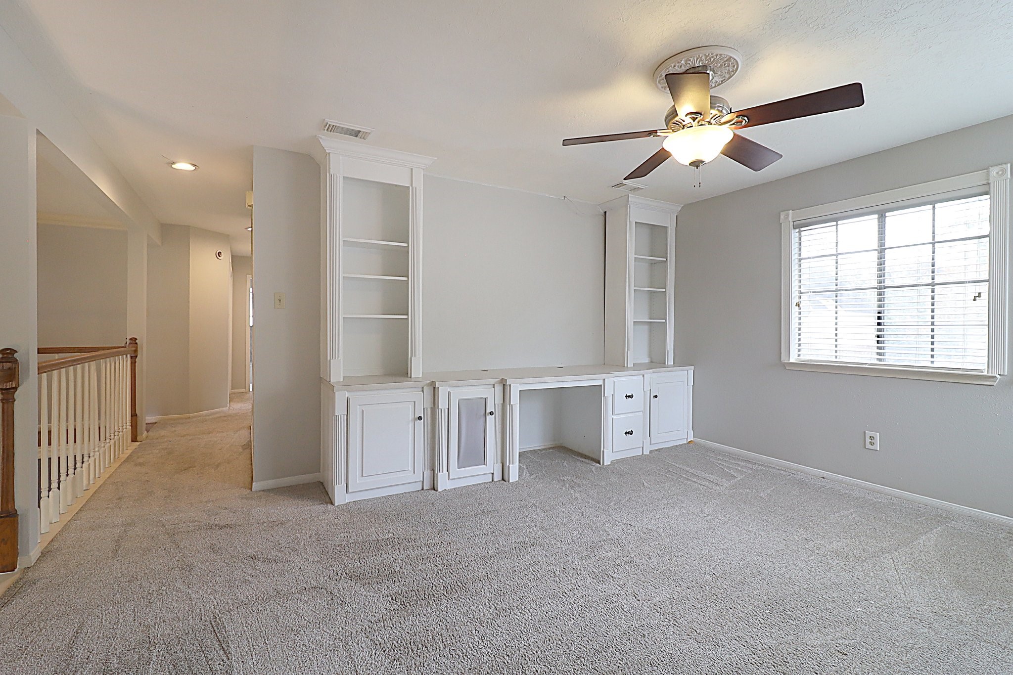 3510 Cypressdale Drive Spring, TX 77388 - Photo 19 of 32 Game room with bookcase and desk and plenty of natural lighting.