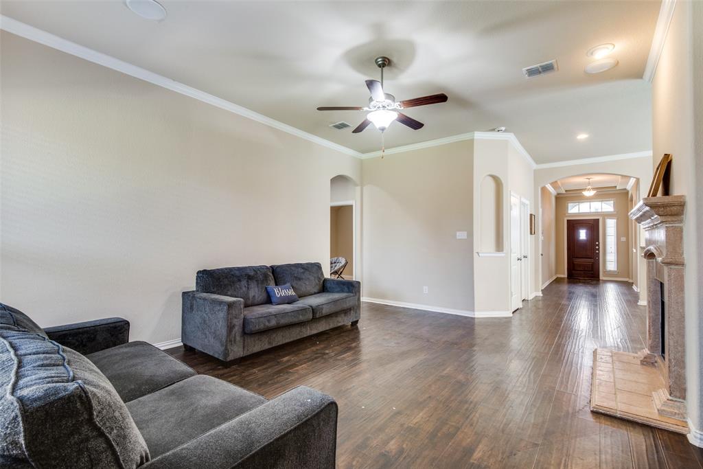16621 Toledo Bend Court Prosper, TX 75078 - Photo 11 of 25 a living room with furniture and a view of kitchen