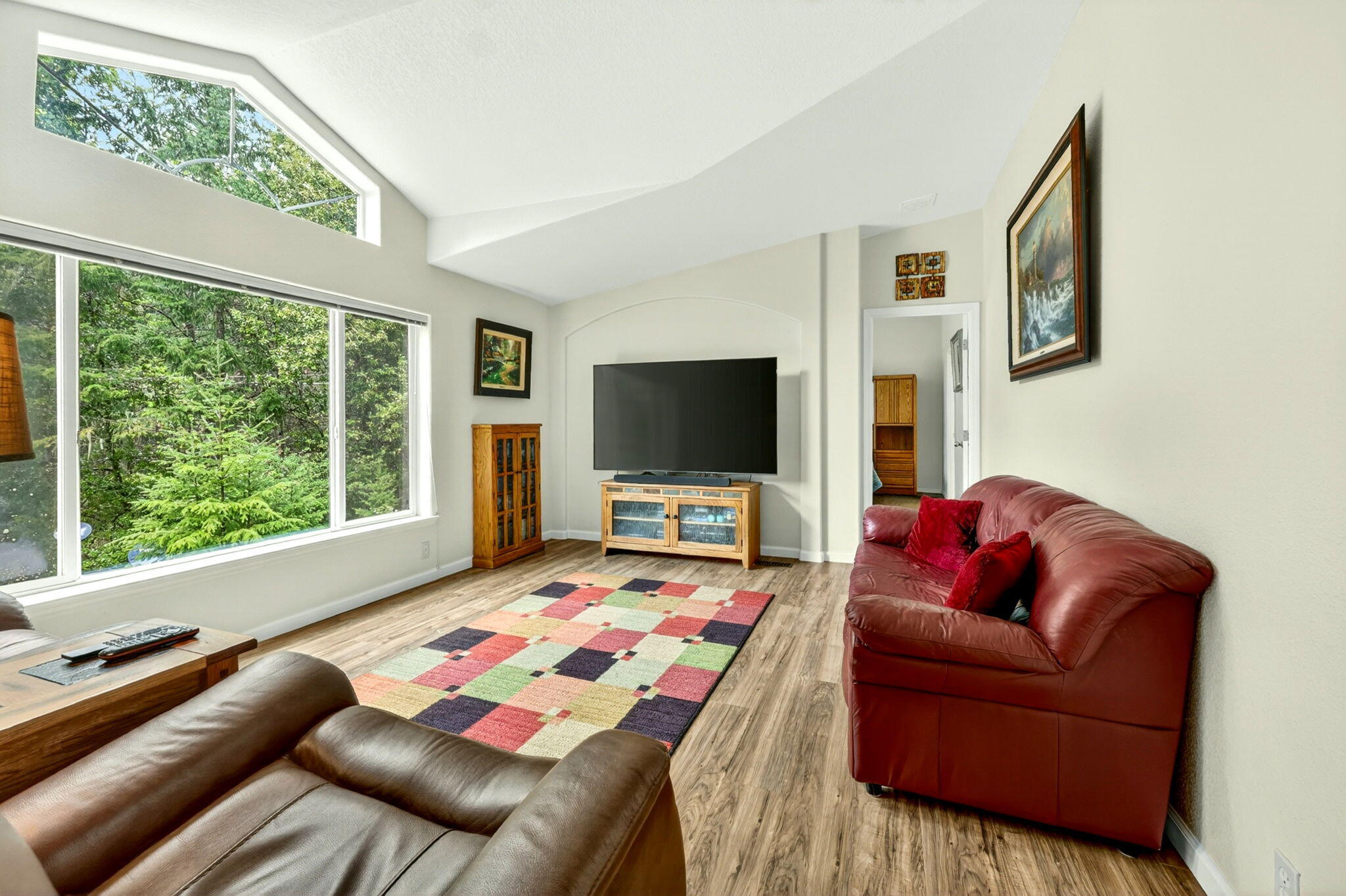 5445 Thompson Creek Road Selma, OR 97538 - Photo 6 of 57 a living room with furniture and a flat screen tv