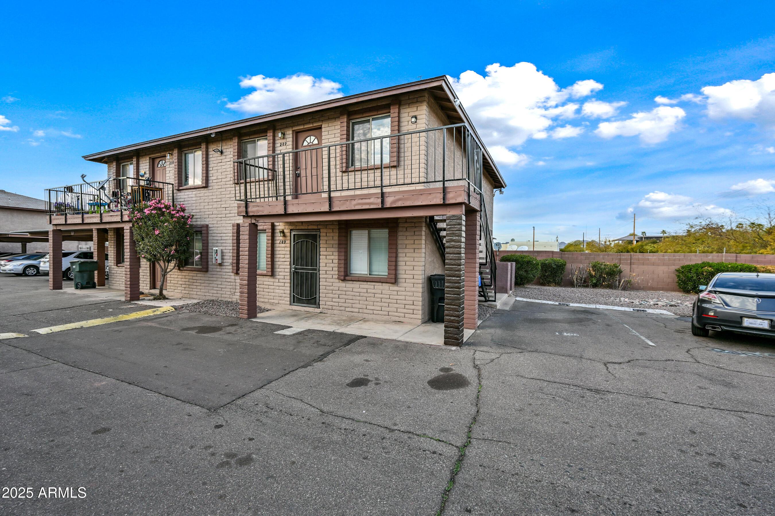 1234 North 36th Street, Unit 209 Phoenix, AZ 85008 - Photo 15 of 15 a view of a house with a yard