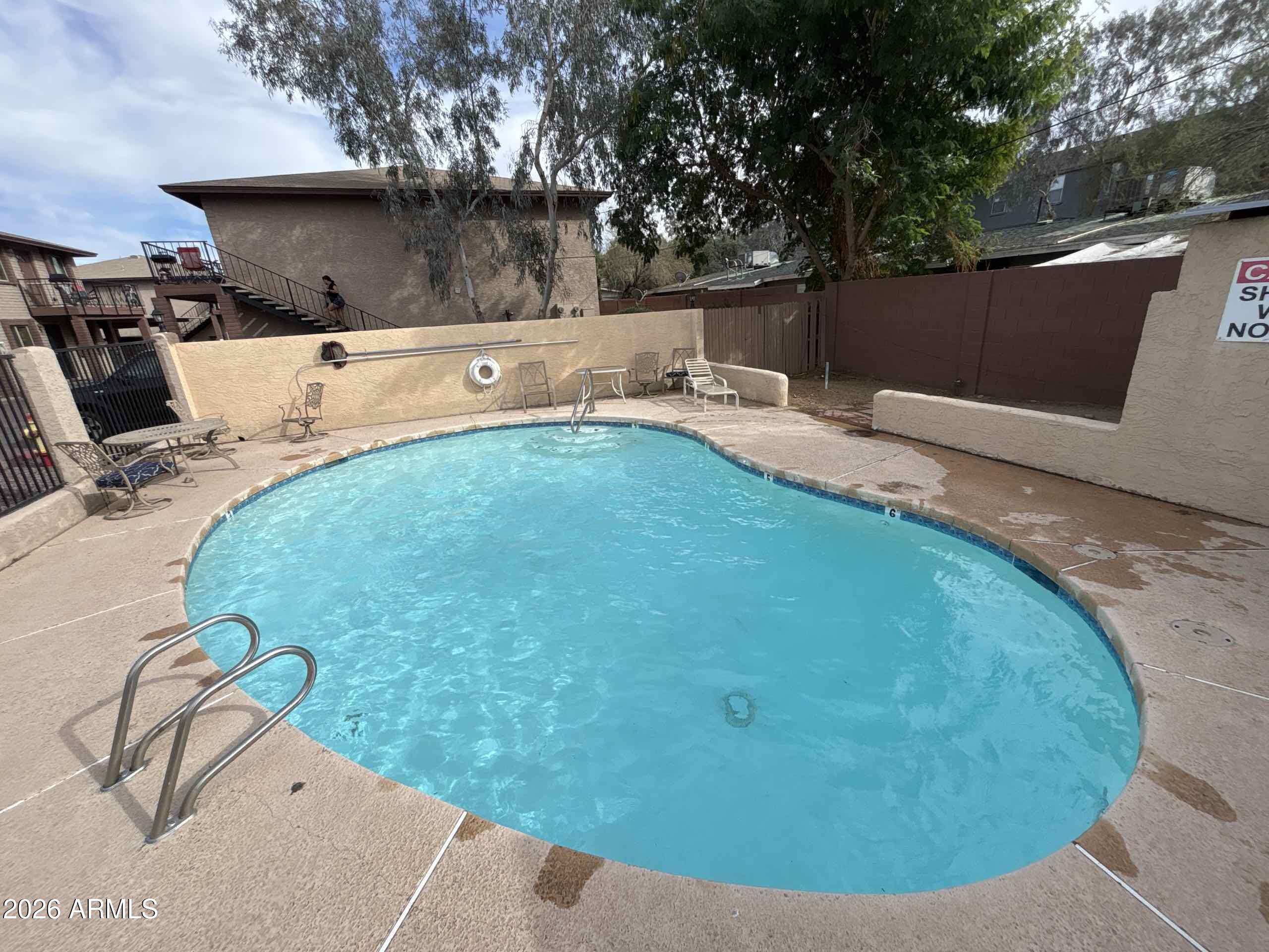 1234 North 36th Street, Unit 209 Phoenix, AZ 85008 - Photo 2 of 15 a view of a backyard