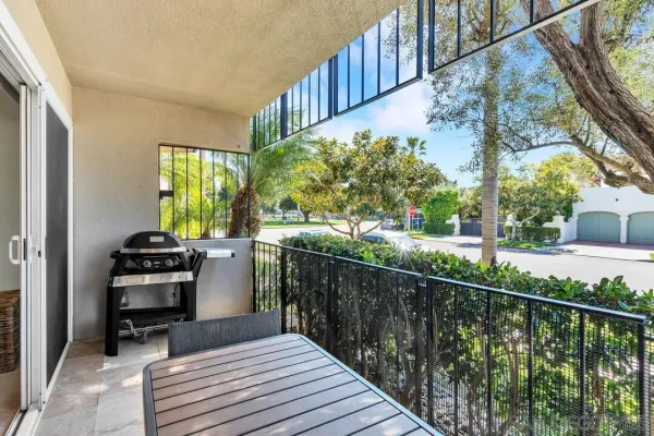 a room with a workspace and a window