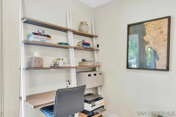 a kitchen with stainless steel appliances granite countertop a sink a refrigerator and a granite counter tops